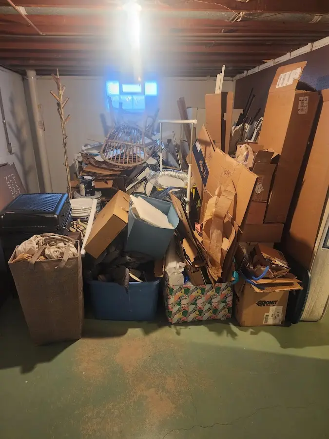 Roll-off dumpster container at job site for Construction Dumpster Rental in New London